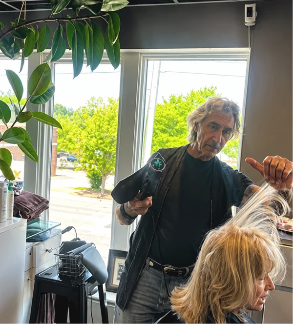 Hair stylist with client